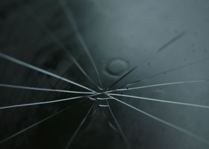 Cracked windshield on a car in Dayton, OH that may need repair or replacement